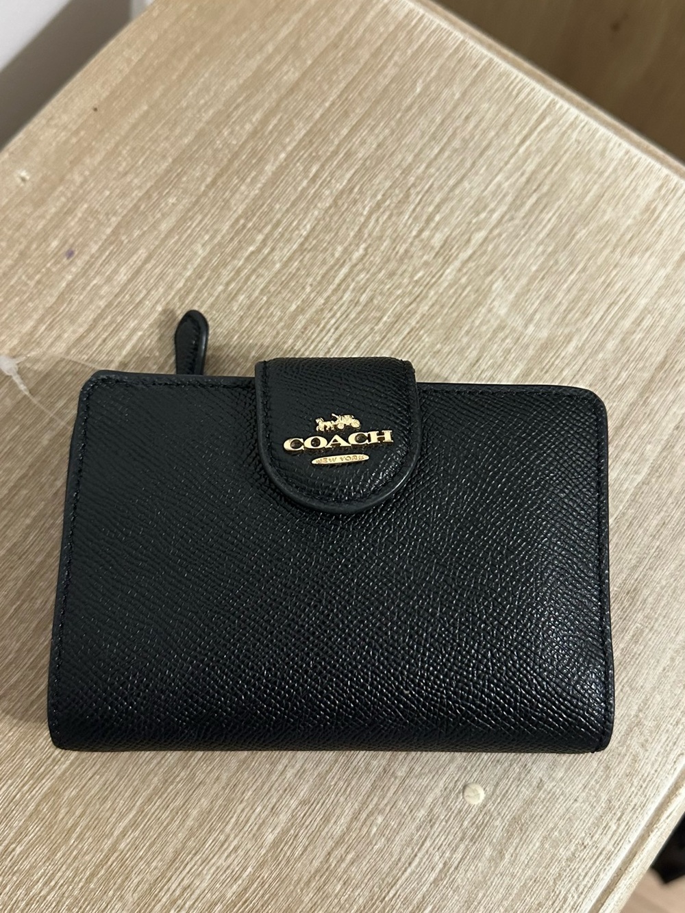 COACH Black Leather Compact Wallet with Gold Logo